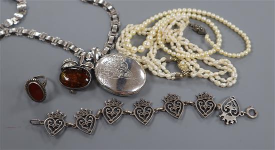 A white metal locket on chain, an Iona white metal bracelet, a brooch, a ring and two pearl necklaces, cultured and freshwater.